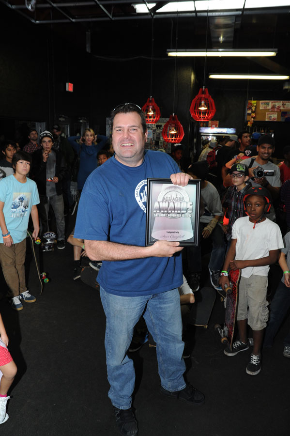 Mike accepting the Tailgate Party Award on behalf